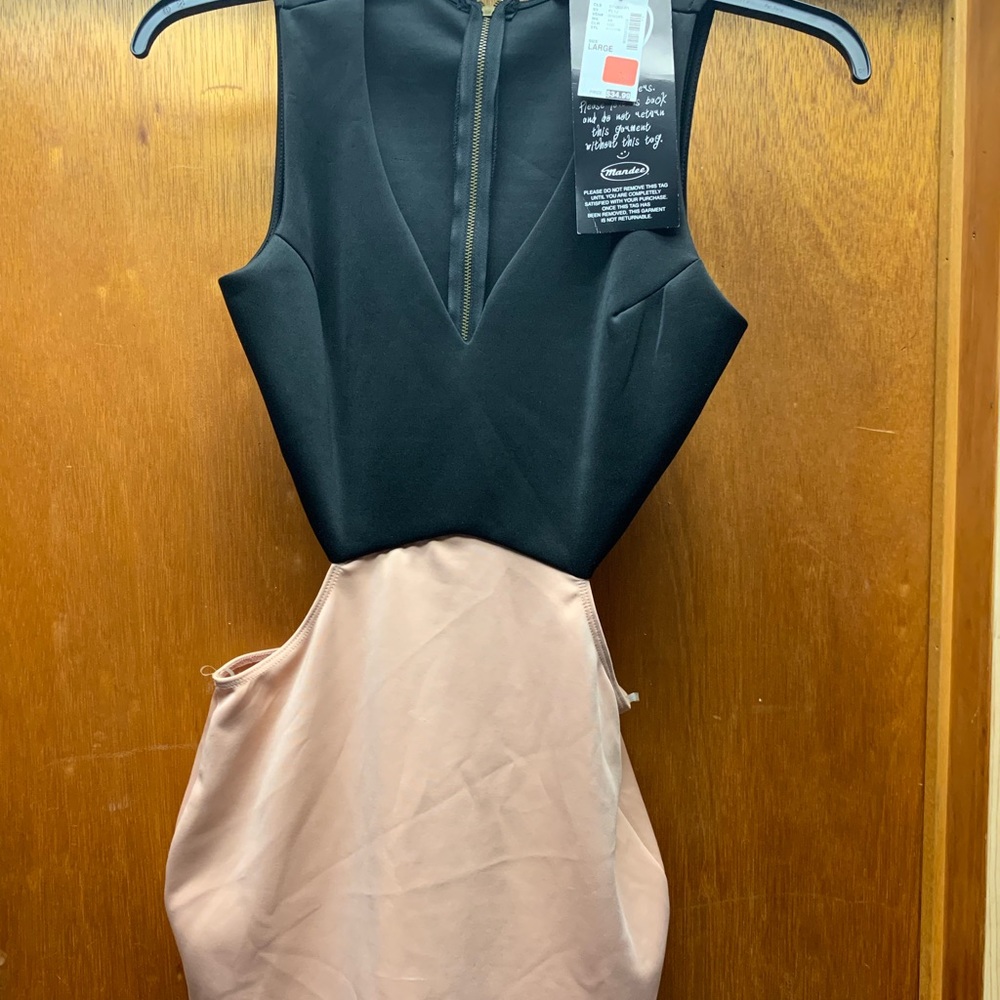 BRAND NEW PEEKABOO DRESS SIZE L